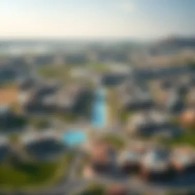 Aerial view of Al Hamra Village showcasing residential areas and amenities