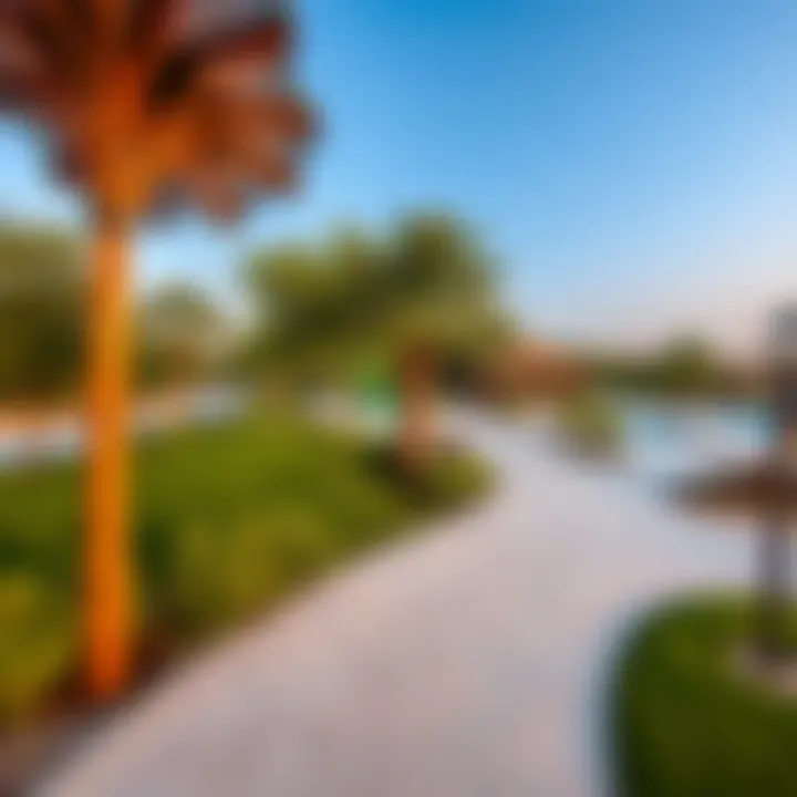 Community park in Al Hamra Village featuring pathways and recreational spaces