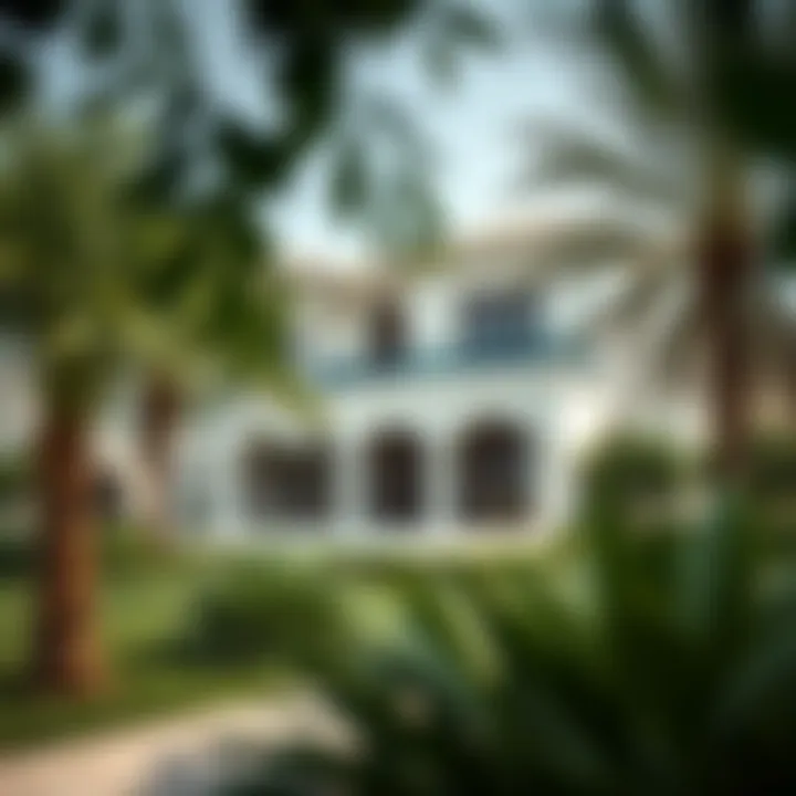 Luxurious villa in Al Hamra Village surrounded by lush greenery