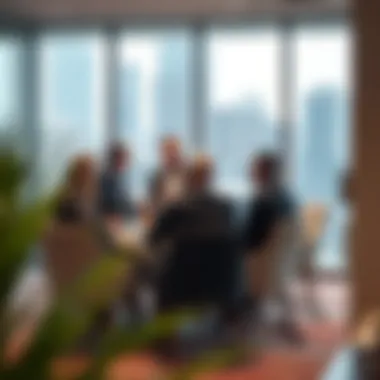 Asteco's team discussing project strategies in an office setting