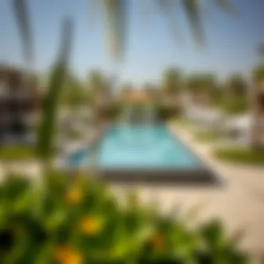 Serene Oasis: Bulgari Resort Pool Experience Luxurious pool area at Bulgari Resort, surrounded by lush landscaping