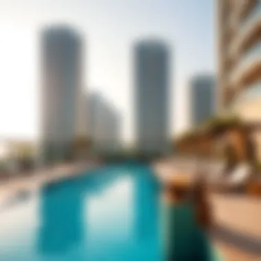 Amenities available at Sparkle Towers, featuring the pool and recreational areas