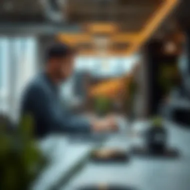 Freelancer working on a laptop in a modern workspace