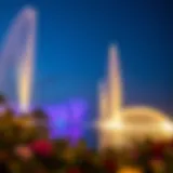 The breathtaking Palm Jumeirah fountain show at night with vibrant lights